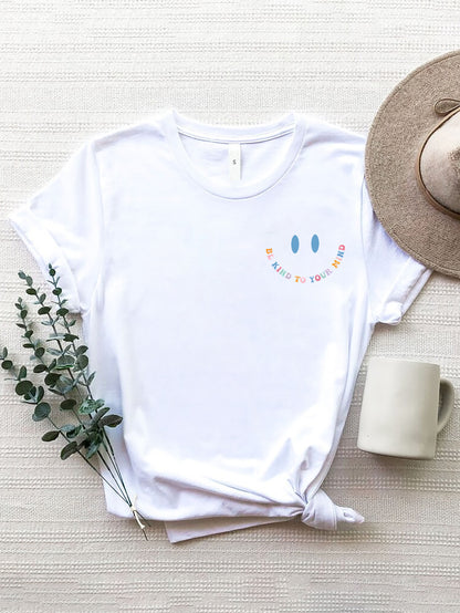 Front view of a white tshirt with a left chest logo with the words 'be kind to your mind' written in shape of a smile with 2 dots for eyes